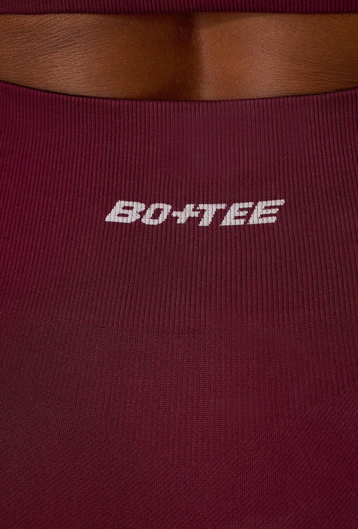 Super Sculpt Seamless Mini Shorts in Plum
